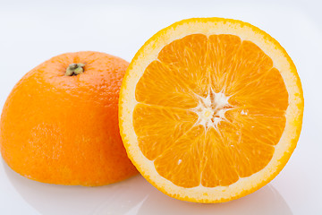 Image showing Fresh orange halved to show the pulp