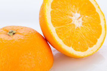 Image showing Fresh orange halved to show the pulp