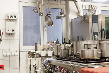 Image showing Neat interior of a commercial kitchen