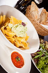 Image showing Crisp corn nachos with guacamole sauce