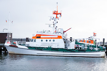 Image showing Cabin cruiser moored in the harbour