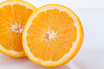 Image showing Fresh orange halved to show the pulp