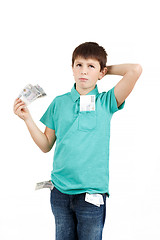 Image showing boy holding czech crown banknotes