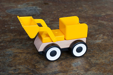 Image showing Simple wheel dozer toy