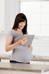 Image showing Pregnant Woman with Digital Tablet