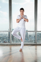 Image showing Young Man Practicing Yoga