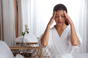 Image showing Young Woman Massaging her Face