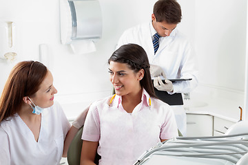 Image showing Nurse Communicating With Female Patient At Dental Clinic