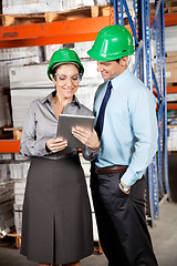 Image showing Female Supervisor And Colleague Using Digital Tablet