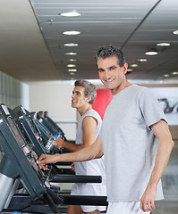 Image showing Men Running On Treadmill
