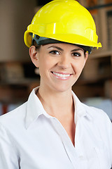 Image showing Female Supervisor Wearing Hardhat At Warehouse