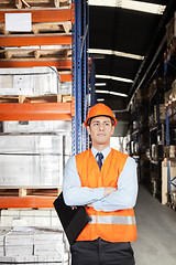 Image showing Male Supervisor With Arms Crossed At Warehouse