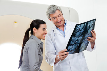 Image showing Radiologist Showing X-ray Report To Patient