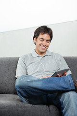 Image showing Happy Man Using Digital Tablet