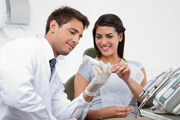 Image showing Dentist Prescribing Tooth Paste To Patient