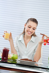 Image showing Happy Woman Having Orange Juice