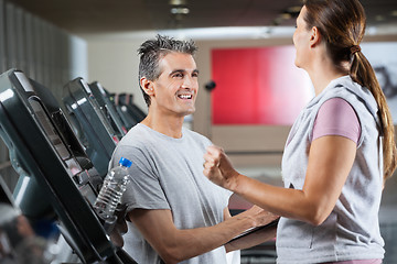 Image showing Instructor With Female Client In Health Center