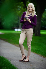 Image showing Woman in Park with Cell Phone