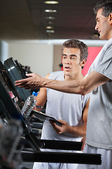 Image showing Man Asking About Machines In Gym