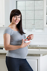 Image showing Woman Eating Healthy Fruit