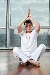 Image showing Young Man Practicing Yoga At Gym