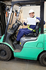 Image showing Forklift Driver Displaying Blank Placard