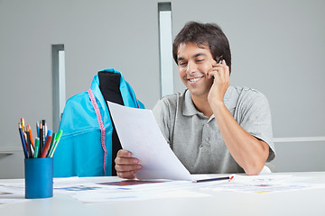 Image showing Designer On a Phone Call