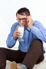 Image showing Man holding Glass of Milk