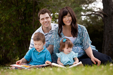 Image showing Family Reading in Park