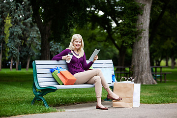 Image showing Shopping Woman Using Digital Tablet