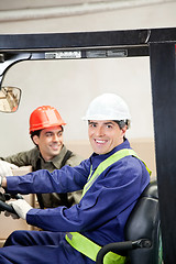 Image showing Casual portrait of two men in Warehouse