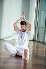 Image showing Young Man Practicing Yoga