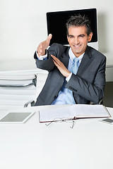Image showing Businessman Offering Handshake In Office