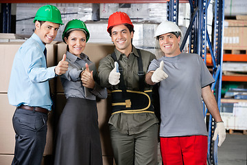 Image showing Happy Foremen And Supervisors Gesturing Thumbs Up