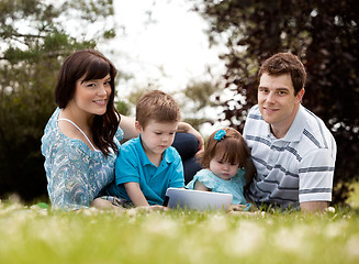 Image showing Family with Digital Tablet Outdoors
