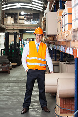 Image showing Confident Supervisor Standing At Warehouse