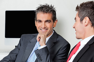 Image showing Happy Businessman With Colleague