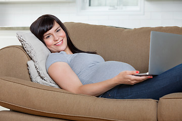 Image showing Relaxed Pregnant Woman Using Laptop