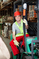 Image showing Foreman Sitting In Forklift At Warehouse