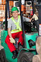 Image showing Mid Adult Forklift Driver At Warehouse