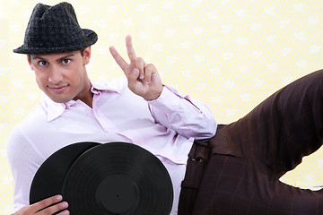Image showing Man Holding Vinyl Record