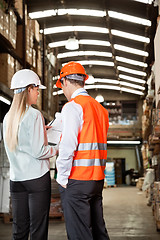 Image showing Supervisors Communicating At Warehouse