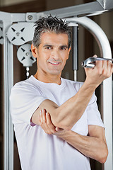 Image showing Mature Man Working Out In Fitness Center