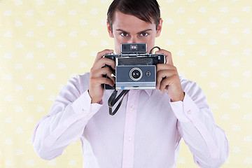 Image showing Retro man with Medium Format Camera