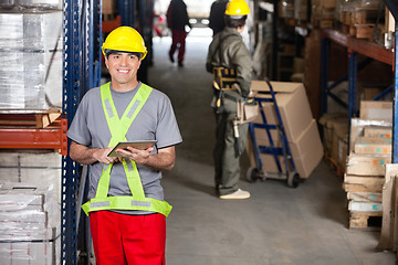 Image showing Mid Adult Foreman With Digital Tablet At Warehouse