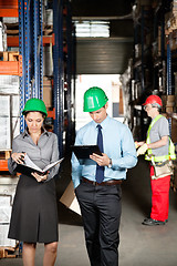 Image showing Supervisors And Foreman Working At Warehouse