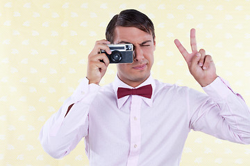 Image showing Retro Male Using Old Camera