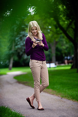 Image showing Woman Using Cell Phone in Park