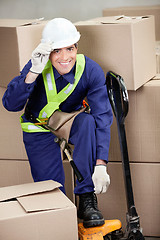 Image showing Foreman With Fork Pallet Truck At Warehouse