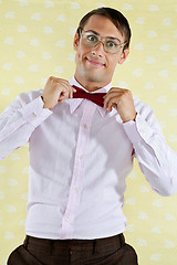 Image showing Geek Adjusting Bowtie